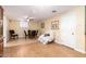 Dining room featuring wood floors, seating, and natural light from the window at 4046 E Crocus Dr, Phoenix, AZ 85032