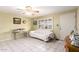Cozy living room with tiled floors, ceiling fan, and comfortable seating area at 4046 E Crocus Dr, Phoenix, AZ 85032