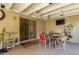 Relaxing covered patio area with dining table and chairs, perfect for outdoor entertaining at 4046 E Crocus Dr, Phoenix, AZ 85032