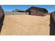 Expansive, enclosed backyard with a blank canvas ready for landscaping and outdoor living at 4195 W Lisa Ln, San Tan Valley, AZ 85144