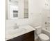 Clean, well-lit bathroom featuring a vanity, toilet, and shower-tub combo at 4195 W Lisa Ln, San Tan Valley, AZ 85144