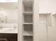 Nicely arranged bathroom with closet and dual sinks with ample storage and a modern design at 4195 W Lisa Ln, San Tan Valley, AZ 85144
