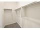 A well-organized walk-in closet with ample shelving and hanging space, maximizing storage and efficiency at 4195 W Lisa Ln, San Tan Valley, AZ 85144