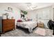 Bright bedroom offers carpet floors and natural light at 4530 E Decatur St, Mesa, AZ 85205