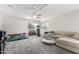 Spacious bonus room with neutral carpet and natural lighting, perfect for exercise or recreation at 4530 E Decatur St, Mesa, AZ 85205