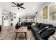 Large open-concept layout shows the living room, kitchen and dining room which are great for entertaining at 4530 E Decatur St, Mesa, AZ 85205