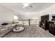 Inviting loft with neutral carpet and ample space for relaxing or entertaining with a view of the floor below at 4530 E Decatur St, Mesa, AZ 85205