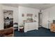 Bedroom featuring blue carpet, white dresser with mirror and a glimpse into the closet at 505 S Ridge --, Mesa, AZ 85204