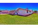 Well-kept lawn, side and back exterior, with a screen patio area at 505 S Ridge --, Mesa, AZ 85204