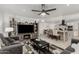 Open living room showcasing living area connected to kitchen with countertop dining at 505 S Ridge --, Mesa, AZ 85204