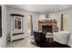 Bright living room with a brick fireplace and stylish seating at 505 S Ridge --, Mesa, AZ 85204