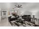 Open living room with sofas, geometric rug and a brick fireplace at 505 S Ridge --, Mesa, AZ 85204