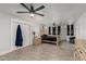 Comfortable main bedroom with a ceiling fan, a closet, and a neutral color palette at 505 S Ridge --, Mesa, AZ 85204