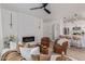 Inviting living room featuring a fireplace, modern lighting, and views into the open kitchen at 5401 E Van Buren St # 1088, Phoenix, AZ 85008