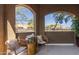 Charming patio area framed by elegant arches, providing a tranquil outdoor retreat at 5401 E Van Buren St # 1088, Phoenix, AZ 85008
