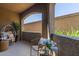 Cozy patio with comfortable seating and an archway view at 5401 E Van Buren St # 1088, Phoenix, AZ 85008
