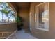 Cozy patio space with potted plants, creating a welcoming entrance to the home at 5401 E Van Buren St # 1088, Phoenix, AZ 85008