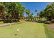 Lush community putting green offers a recreational amenity for residents and guests to enjoy at 5401 E Van Buren St # 1088, Phoenix, AZ 85008