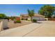 Well-maintained home with a three-car garage and desert landscaping, offering convenience and curb appeal at 5534 W Riviera Dr, Glendale, AZ 85304