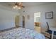 Spacious bedroom with a view into the ensuite bathroom and closets at 5919 W Blackhawk Dr, Glendale, AZ 85308