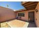 Private patio with brick pavers, a grill, and a table, perfect for outdoor entertaining in a fenced area at 6008 W Augusta Ave, Glendale, AZ 85301