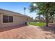 Large backyard with a brick-tile patio and a view of the refreshing pool, perfect for outdoor entertaining at 7027 W Midway Ave, Glendale, AZ 85303