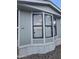 Close-up of the front exterior with a bay window at 730 S Country Club Dr # 62, Mesa, AZ 85210