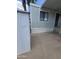 View of home exterior featuring window and covered parking area, offering practical outdoor space at 730 S Country Club Dr # 62, Mesa, AZ 85210