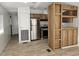 Open-concept kitchen featuring stainless steel appliances and wood cabinets at 730 S Country Club Dr # 62, Mesa, AZ 85210