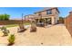 Outdoor space with patio seating, modern outdoor furniture, desert landscaping, and string lights at 820 E Constance Way, Phoenix, AZ 85042