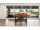 Dining area featuring a large sliding glass door that offers a view of the lush backyard at 820 E Constance Way, Phoenix, AZ 85042