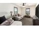 Comfortable living room featuring neutral tones, plush seating, and an inviting atmosphere at 820 E Constance Way, Phoenix, AZ 85042