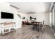 Open-concept living space with modern furnishings and abundant natural light, perfect for entertaining at 820 E Constance Way, Phoenix, AZ 85042