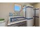 Unique bathroom featuring patterned tiles, a decorative sink, and a walk-in shower at 8306 E Buckskin Trl, Scottsdale, AZ 85255