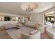 Bright living room with comfortable seating, stylish decor, and views of the outdoors at 8306 E Buckskin Trl, Scottsdale, AZ 85255