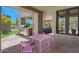 Inviting outdoor area with a built-in barbecue and dining table for entertaining guests at 8306 E Buckskin Trl, Scottsdale, AZ 85255