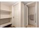 Hallway with access to closet and a bathroom at 9011 N 52Nd Ave, Glendale, AZ 85302