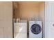 Laundry area with washer and dryer at 9011 N 52Nd Ave, Glendale, AZ 85302