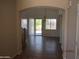 View of entryway with tile flooring, archway, and lots of natural light at 9018 W Superior Ave, Tolleson, AZ 85353