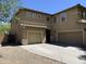 Two-story home featuring a tile roof, three-car garage, and a spacious driveway offers modern comfort at 9018 W Superior Ave, Tolleson, AZ 85353