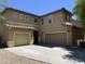 Two-story home featuring a tile roof, three-car garage, and a spacious driveway offers modern comfort at 9018 W Superior Ave, Tolleson, AZ 85353