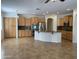 Spacious kitchen with granite countertops, stainless steel appliances, and ample cabinet space at 9018 W Superior Ave, Tolleson, AZ 85353