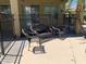 Covered patio featuring comfortable wicker seating, ideal for relaxing outdoors and enjoying the fresh air at 9018 W Superior Ave, Tolleson, AZ 85353
