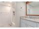 Bathroom featuring a granite countertop vanity, framed mirror and shower with white curtain at 930 S Dobson Rd # 3, Mesa, AZ 85202