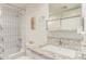 Bathroom with white tiled shower, modern vanity, and granite countertop at 930 S Dobson Rd # 3, Mesa, AZ 85202
