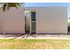 Contemporary townhouse with private courtyard entry, desert landscaping, and a flat roof design at 930 S Dobson Rd # 3, Mesa, AZ 85202