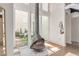 Bright living room showcasing modern fireplace, large windows, and seamless access to a private outdoor patio at 930 S Dobson Rd # 3, Mesa, AZ 85202