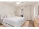 Bright main bedroom featuring plush carpeting, large bed, and a walk in closet at 930 S Dobson Rd # 3, Mesa, AZ 85202