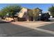 Two story home featuring a light brown stucco exterior, terracotta roof, and two car garage at 9904 E Elena Ave, Mesa, AZ 85208