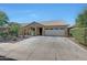 Charming single-story home with a well-maintained front yard and spacious driveway at 9926 W Gross Ave, Tolleson, AZ 85353